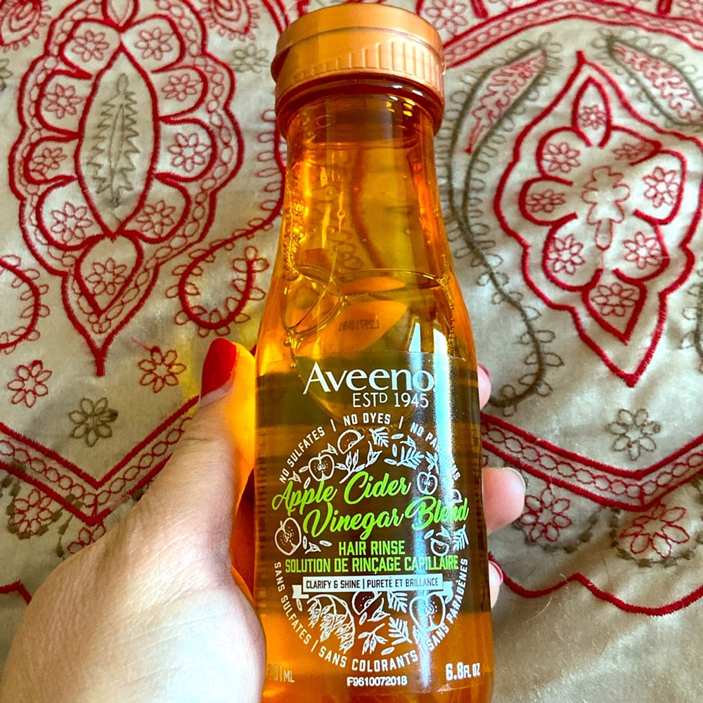 Aveeno Apple cider vinegar blend hair rinse.